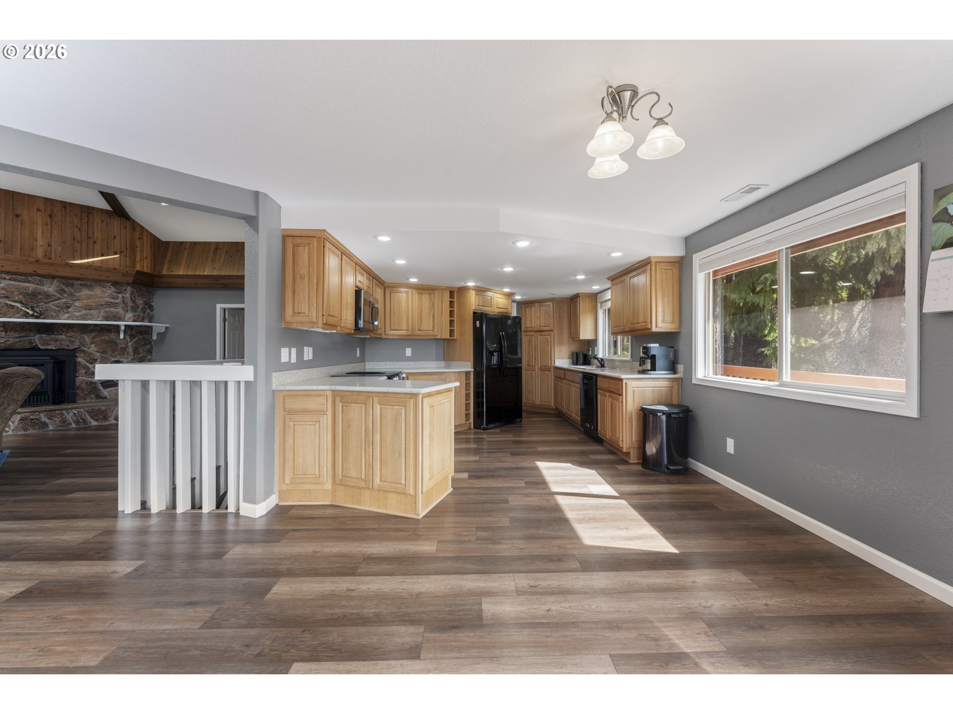2453 Stephanie Lane North Bend, OR 97459 - Photo 10 of 48 a view of kitchen with furniture and wooden floor