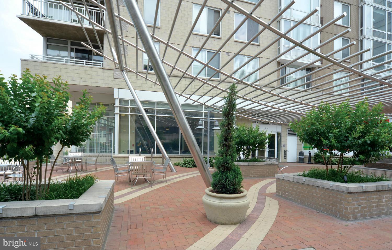 930 Wayne Avenue, Unit 207 Silver Spring, MD 20910 - Photo 1 of 9 a view of a patio with plants and plants