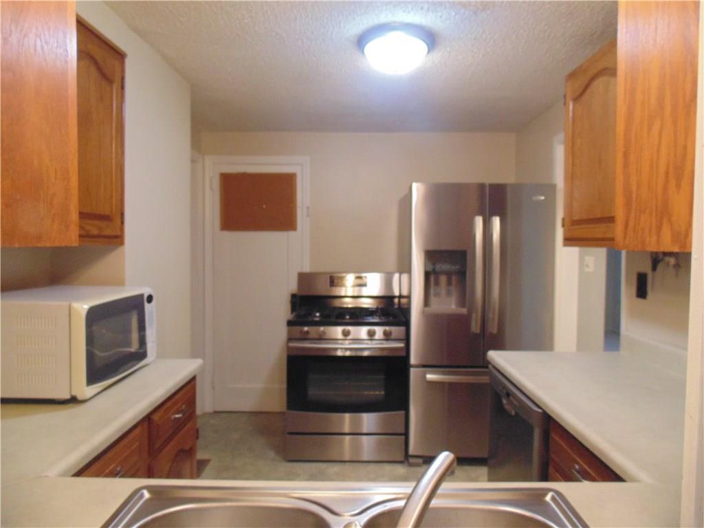 Stainless steel appliances less than a year old accompany the property.