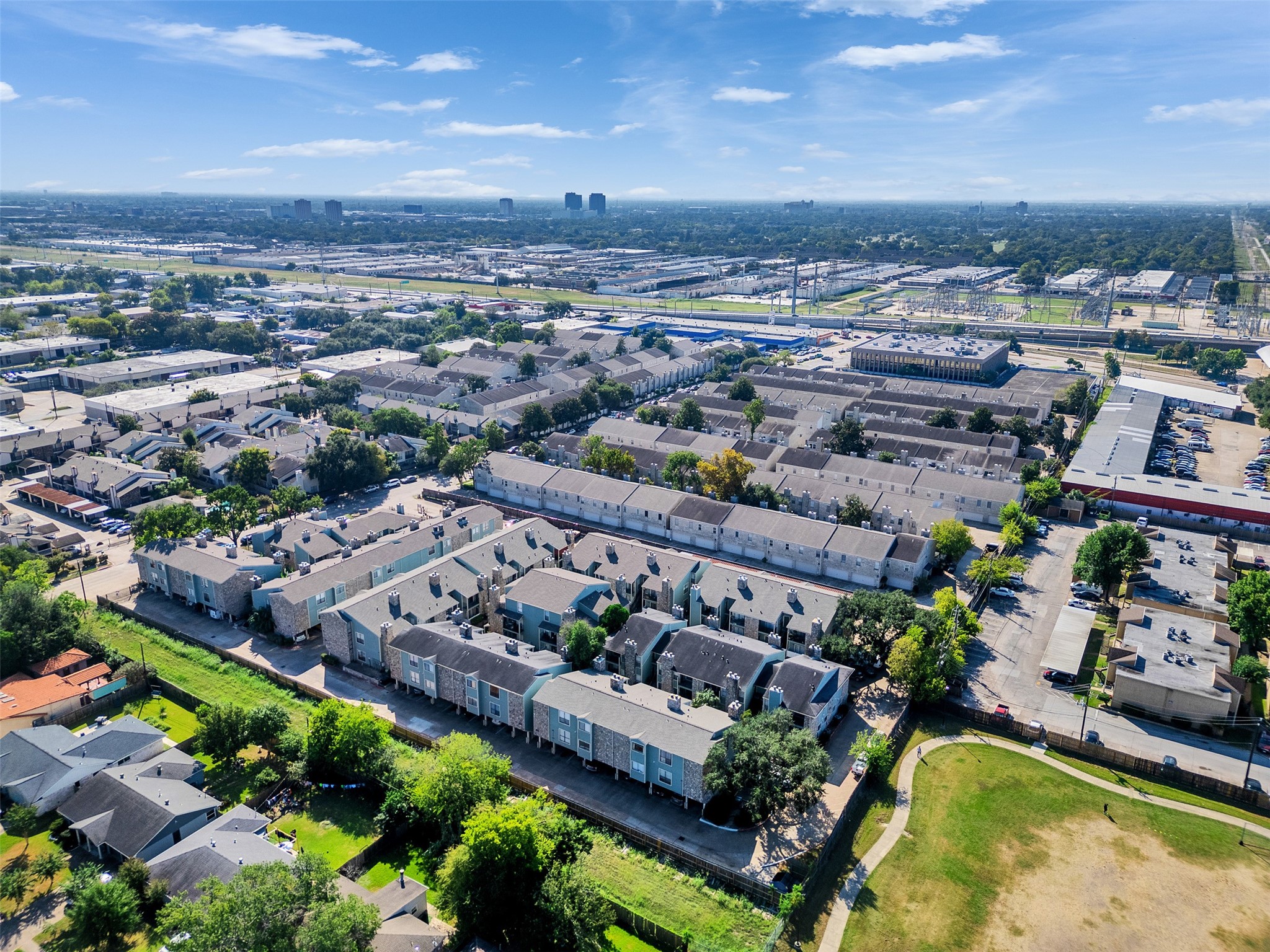 3764 Tanglewilde Street, Unit H8 Houston, TX 77063 - Photo 6 of 22 an aerial view of a house with a swimming pool