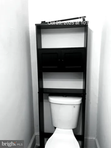 a kitchen with a microwave and cabinets