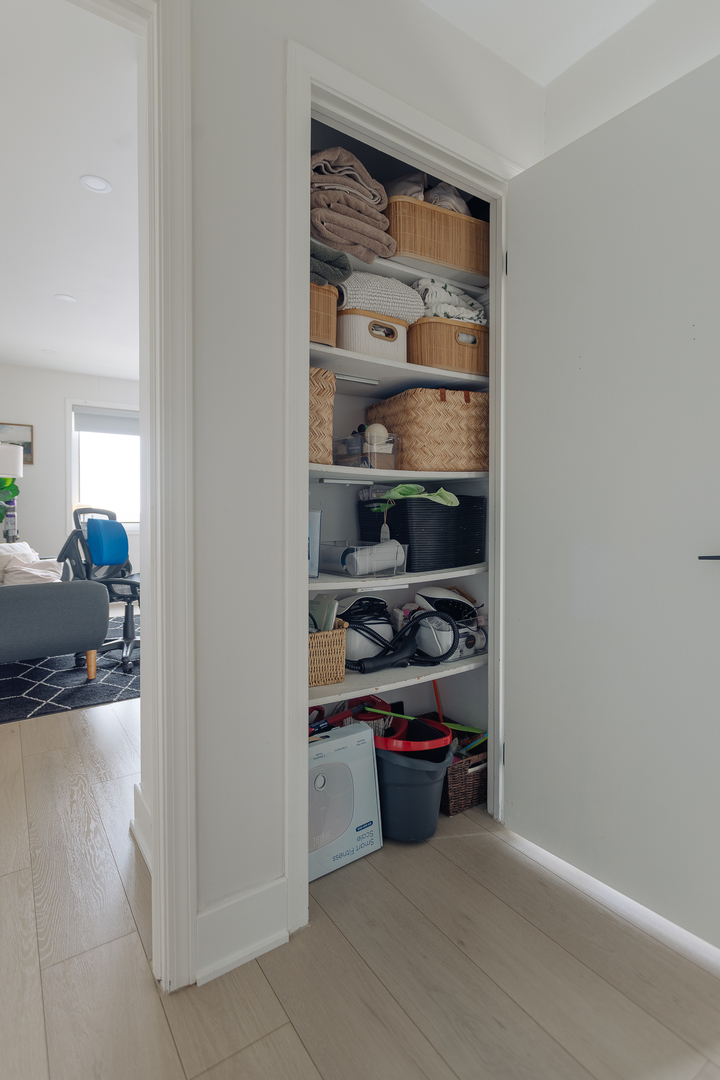 8100 West Foster Lane, Unit 508 Niles, IL 60714 - Photo 30 of 42 a view of a living room and bedroom with wooden floor