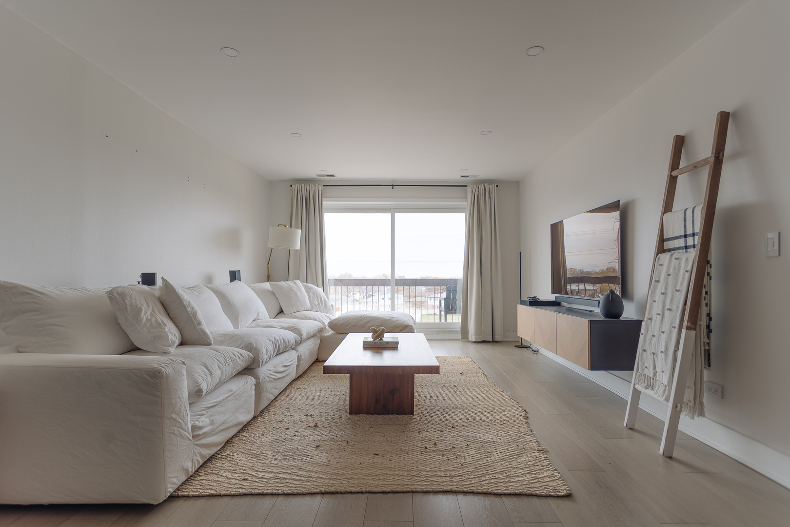 8100 West Foster Lane, Unit 508 Niles, IL 60714 - Photo 4 of 42 a living room with furniture and a window