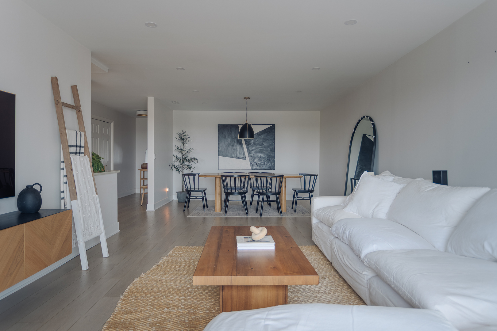 8100 West Foster Lane, Unit 508 Niles, IL 60714 - Photo 7 of 42 a living room with furniture rug and wooden floor