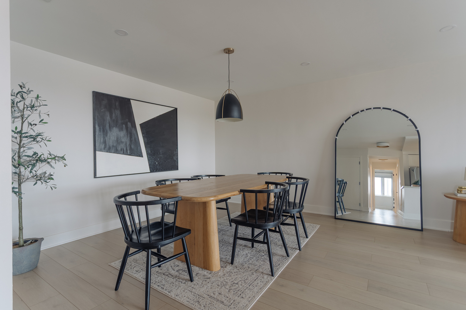 8100 West Foster Lane, Unit 508 Niles, IL 60714 - Photo 8 of 42 a view of a dining room with furniture and chandelier