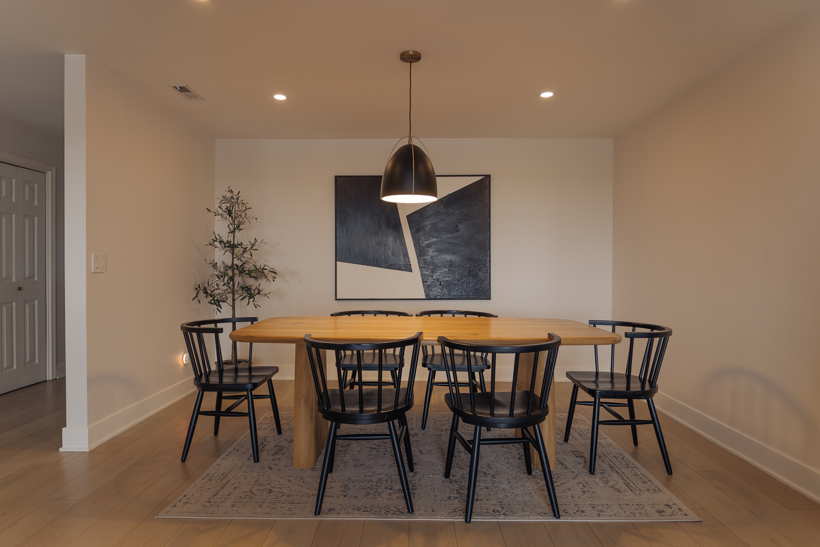 8100 West Foster Lane, Unit 508 Niles, IL 60714 - Photo 9 of 42 a dining room with furniture and wooden floor