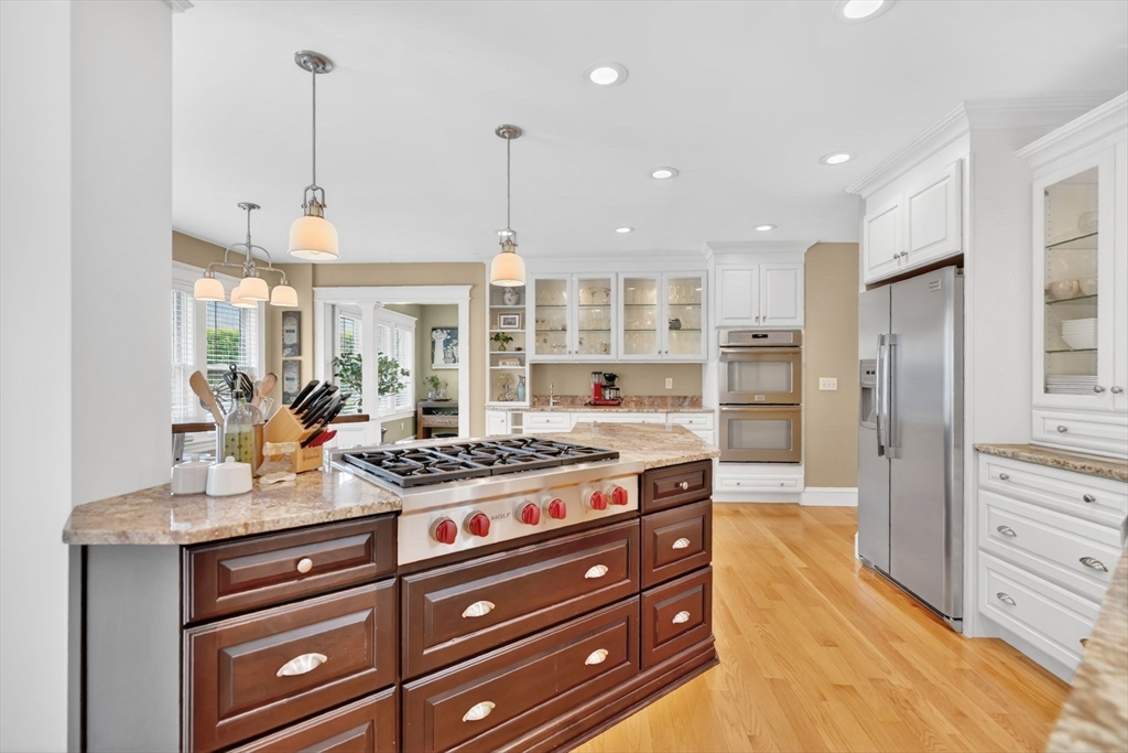 34 Main Street Wilbraham, MA 01095 - Photo 12 of 41 a kitchen with stainless steel appliances granite countertop a stove a sink and a refrigerator