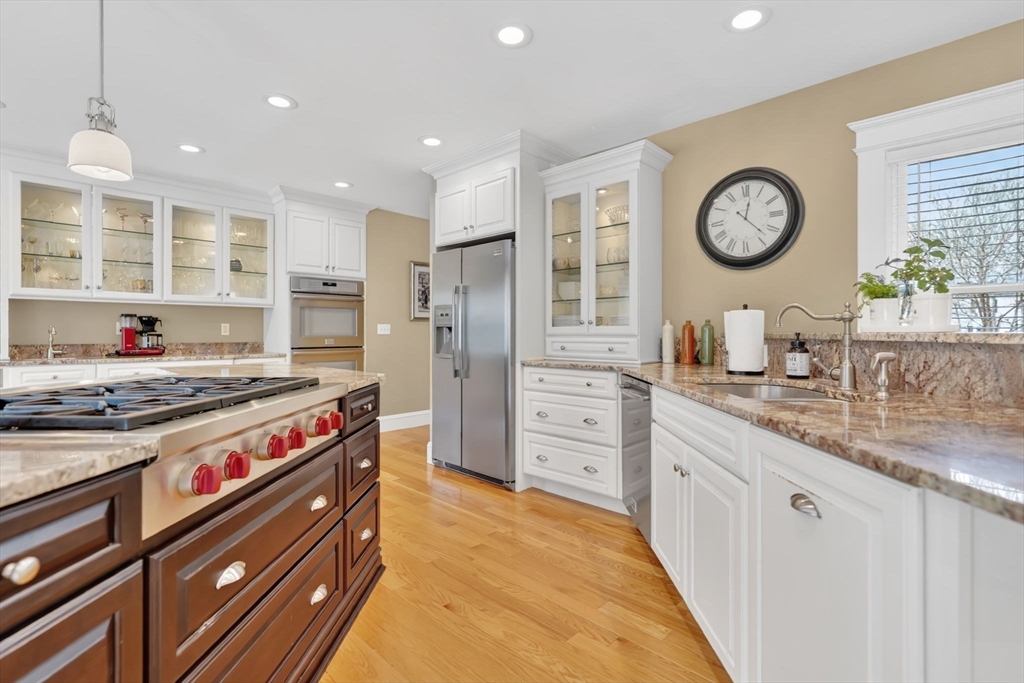 34 Main Street Wilbraham, MA 01095 - Photo 13 of 41 a kitchen with stainless steel appliances granite countertop a stove and a kitchen view