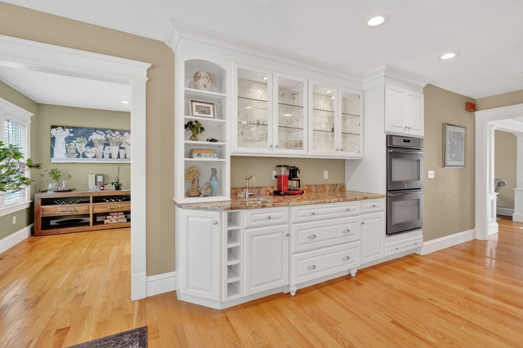 34 Main Street Wilbraham, MA 01095 - Photo 16 of 41 a kitchen with stainless steel appliances cabinets and wooden floor
