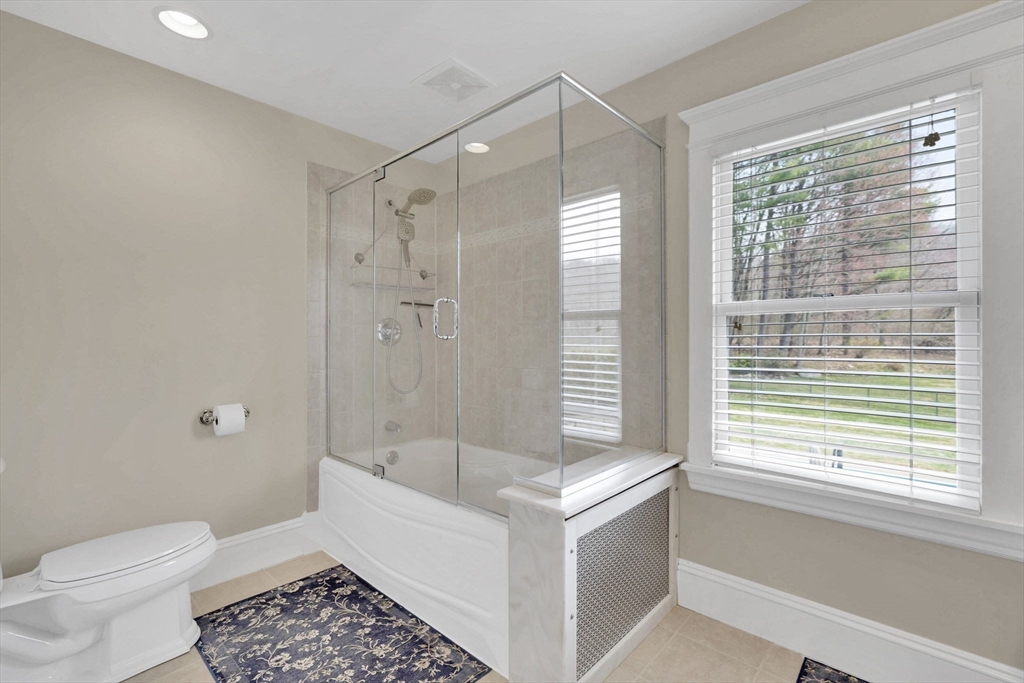 34 Main Street Wilbraham, MA 01095 - Photo 26 of 41 a bathroom with a sink a toilet and shower