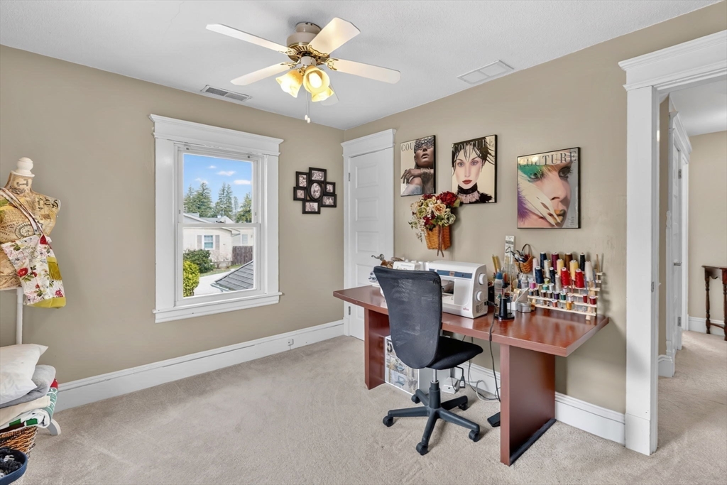 34 Main Street Wilbraham, MA 01095 - Photo 29 of 41 a view of a workspace with furniture and a window