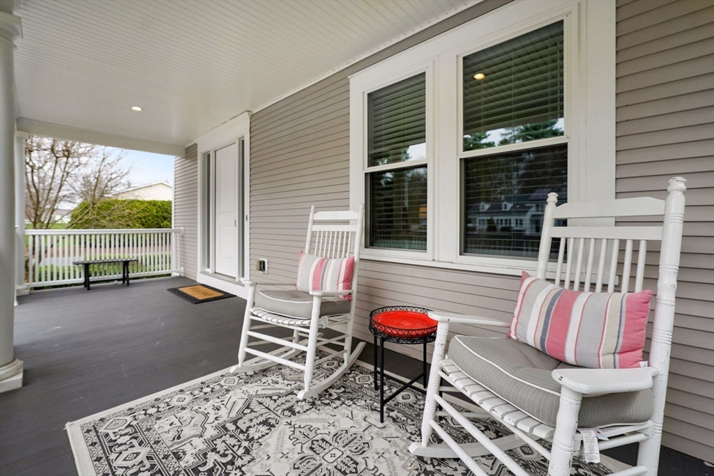 34 Main Street Wilbraham, MA 01095 - Photo 4 of 41 a backyard of a house with table and chairs