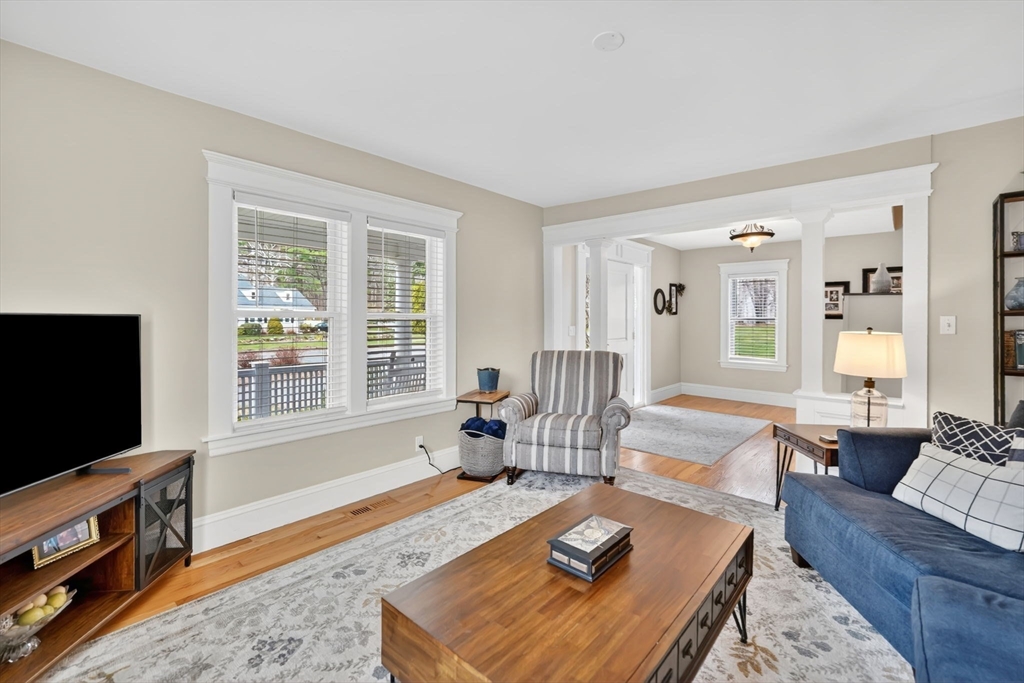 34 Main Street Wilbraham, MA 01095 - Photo 7 of 41 a living room with furniture and a flat screen tv