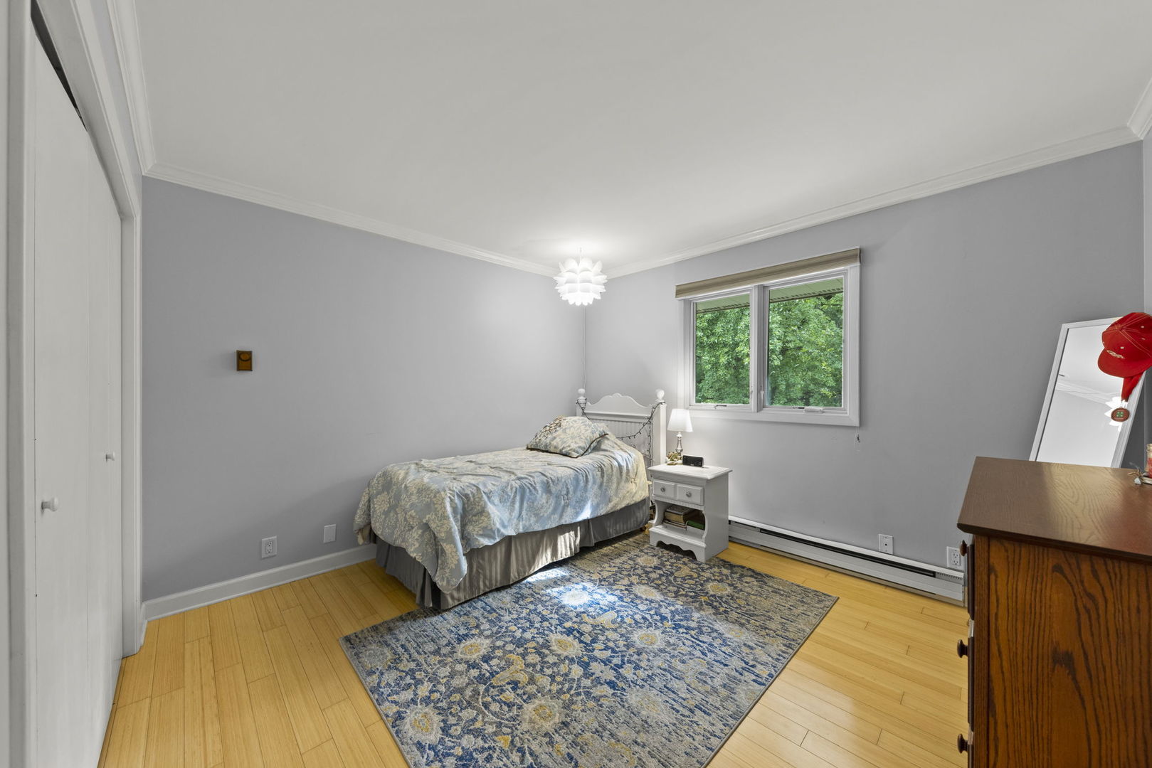 4083 West Sandwich Road Sandwich, IL 60548 - Photo 23 of 74 a bedroom with a bed and a rug