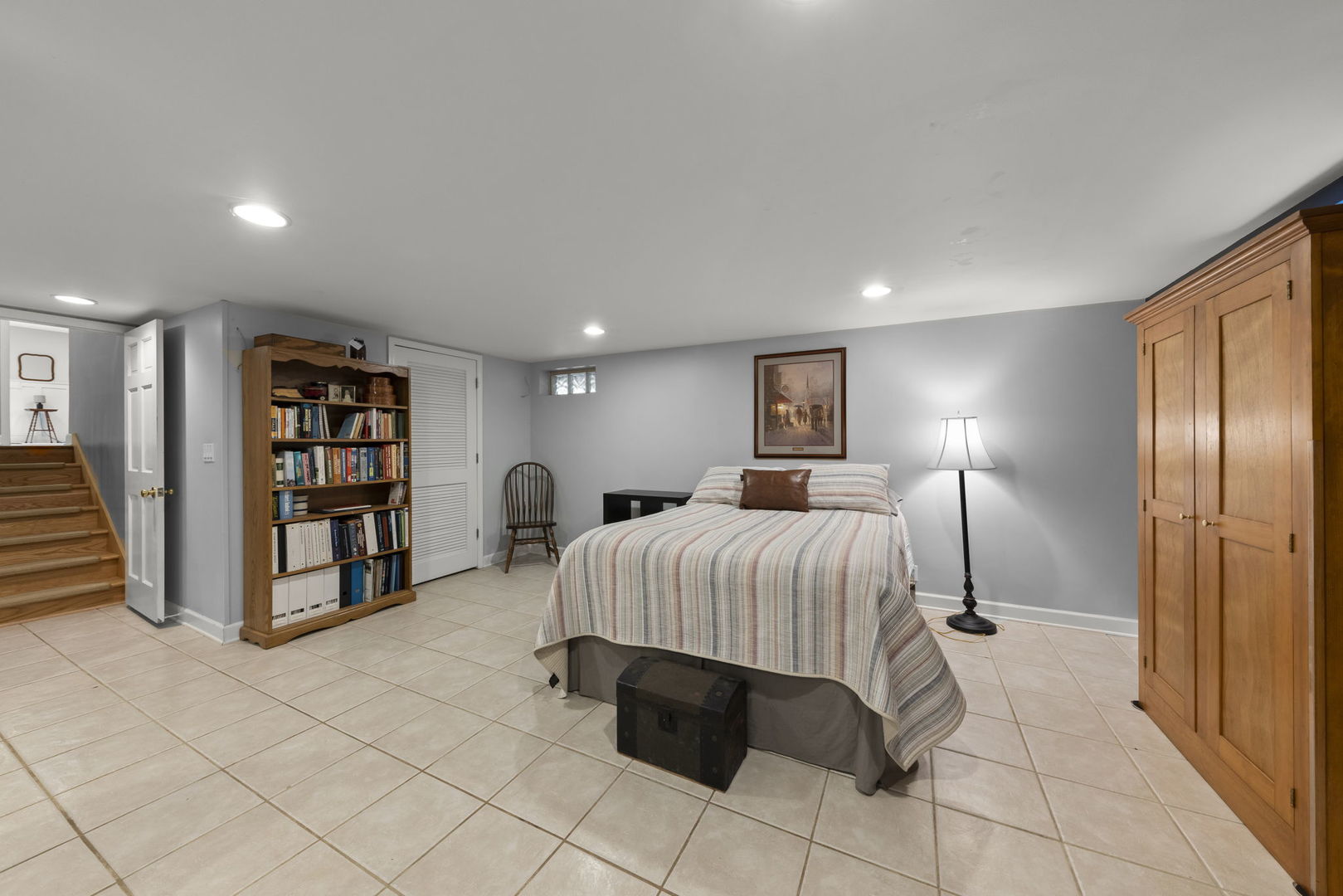 4083 West Sandwich Road Sandwich, IL 60548 - Photo 32 of 74 a bedroom with a large bed and a walk in closet