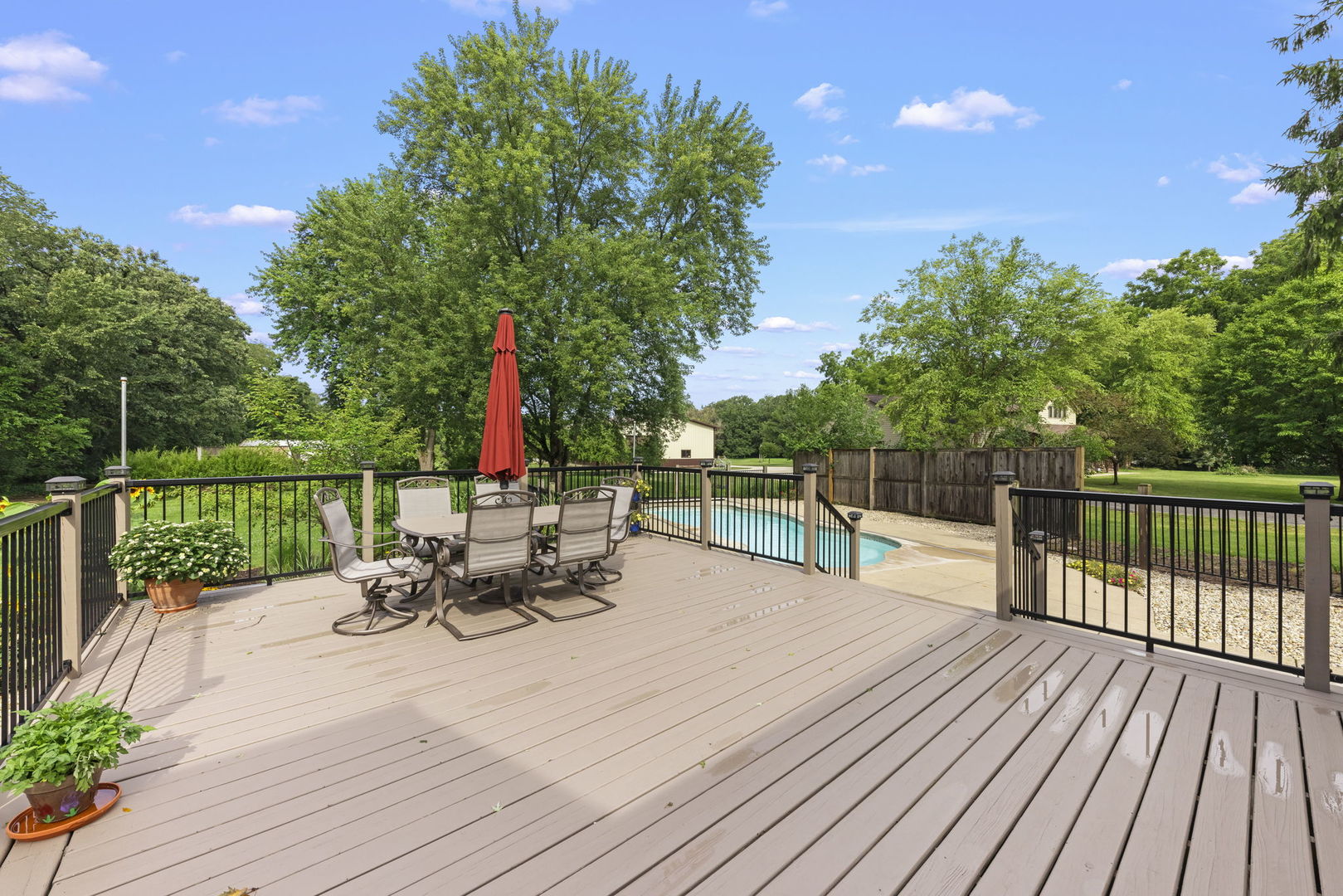 4083 West Sandwich Road Sandwich, IL 60548 - Photo 39 of 74 a view of a deck with furniture and garden