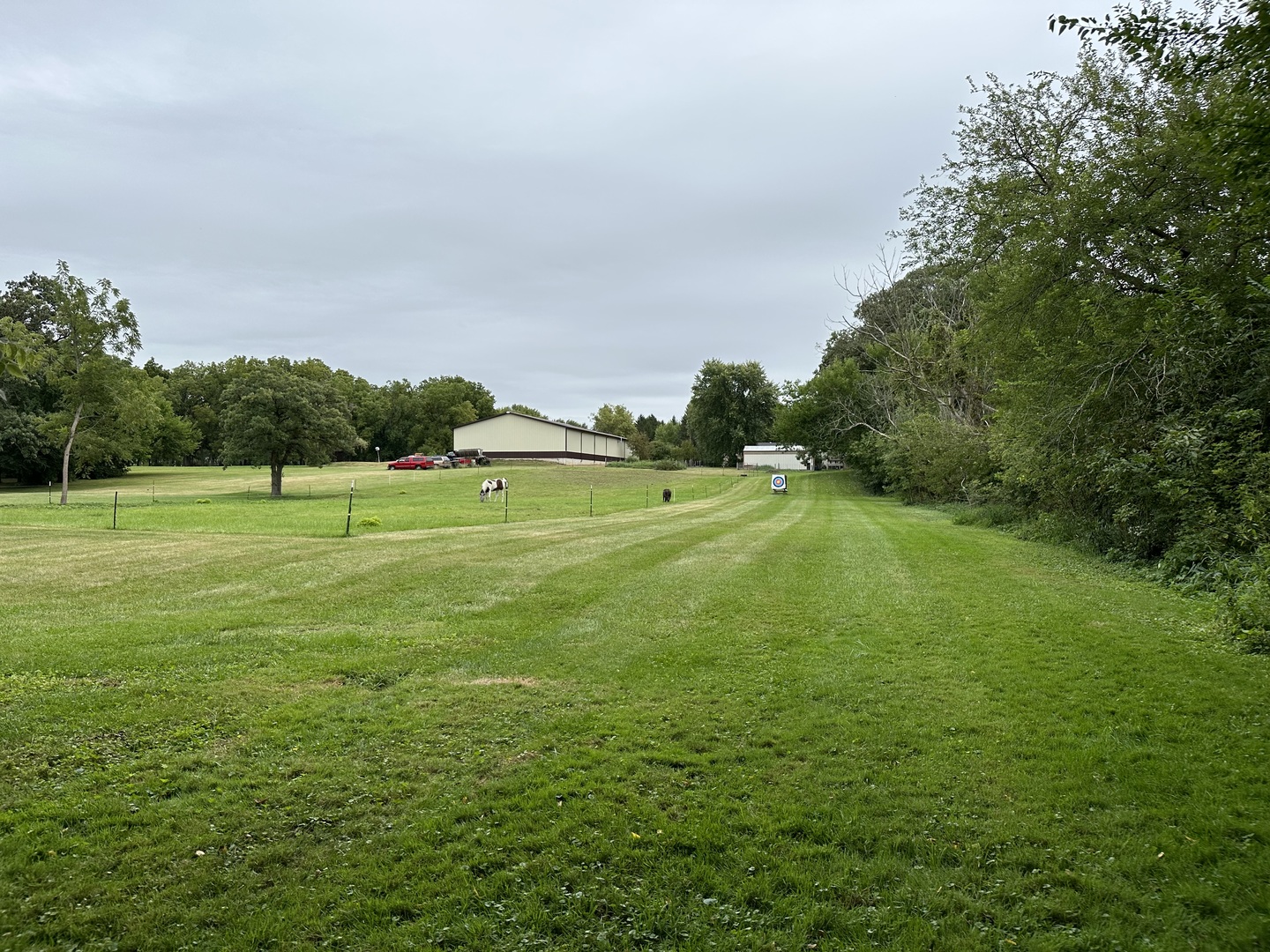 4083 West Sandwich Road Sandwich, IL 60548 - Photo 4 of 74 a view of a golf course with a lake