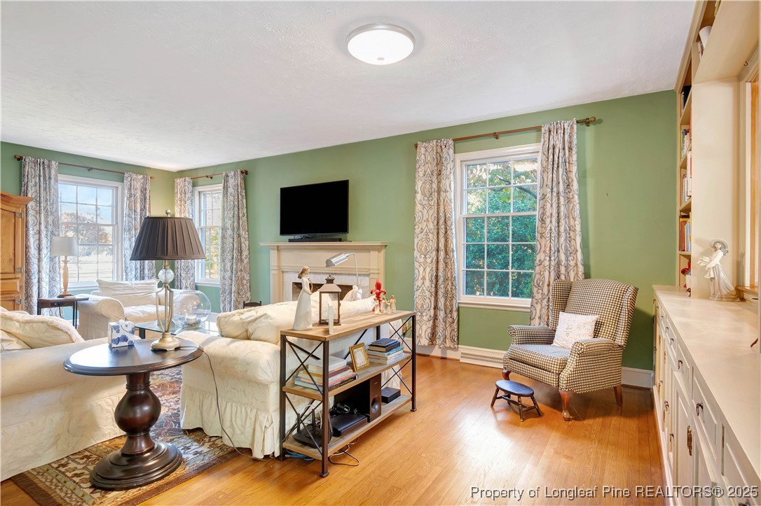 704 B T Road Lumberton, NC 28358 - Photo 11 of 45 a living room with furniture and a flat screen tv