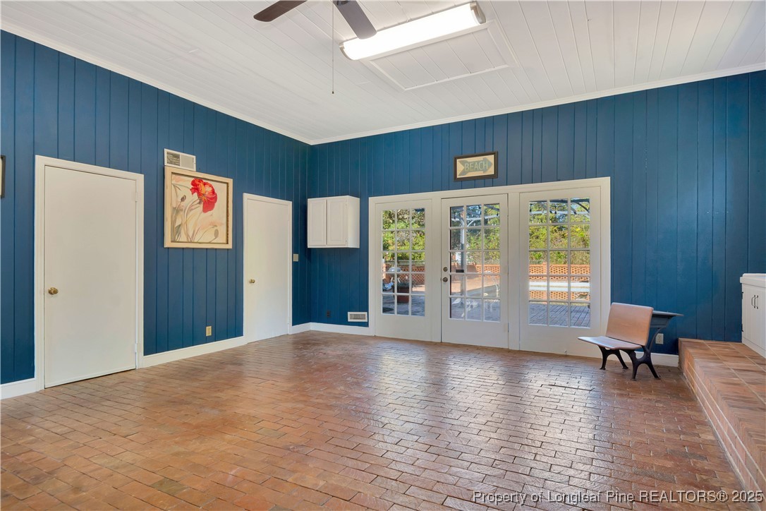 704 B T Road Lumberton, NC 28358 - Photo 20 of 45 a view of an empty room with glass door