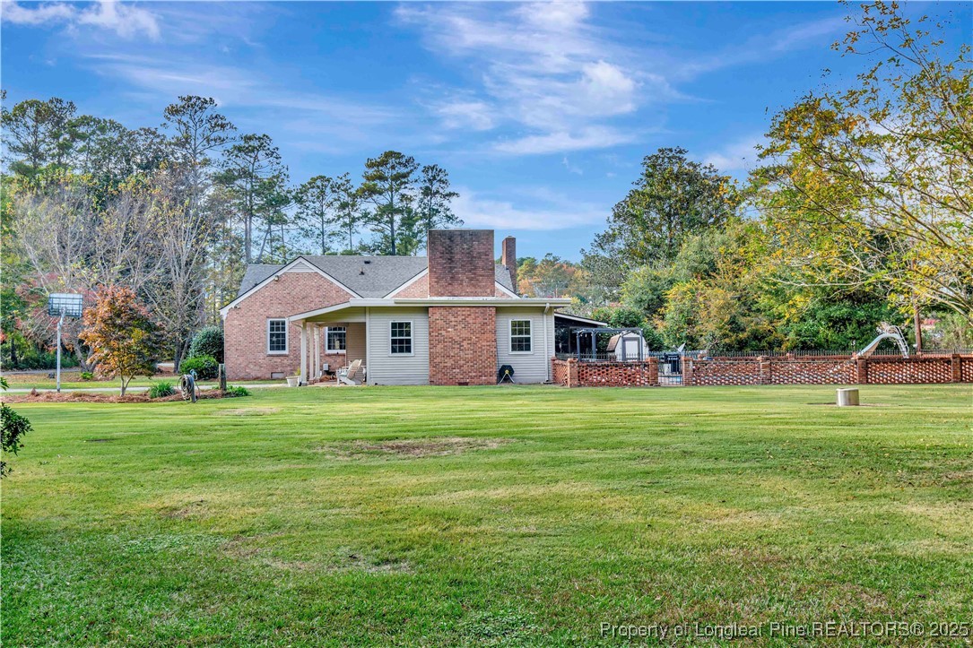 704 B T Road Lumberton, NC 28358 - Photo 38 of 45 a front view of a house with a yard