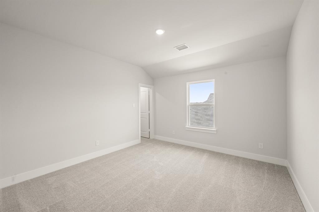 1724 Nesting Robin Lane Krum, TX 76249 - Photo 25 of 40 an empty room with a window