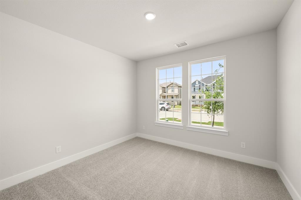 1724 Nesting Robin Lane Krum, TX 76249 - Photo 26 of 40 an empty room with a window