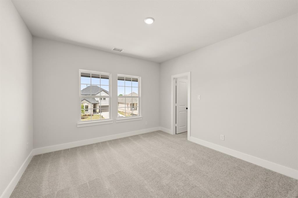 1724 Nesting Robin Lane Krum, TX 76249 - Photo 29 of 40 an empty room with windows