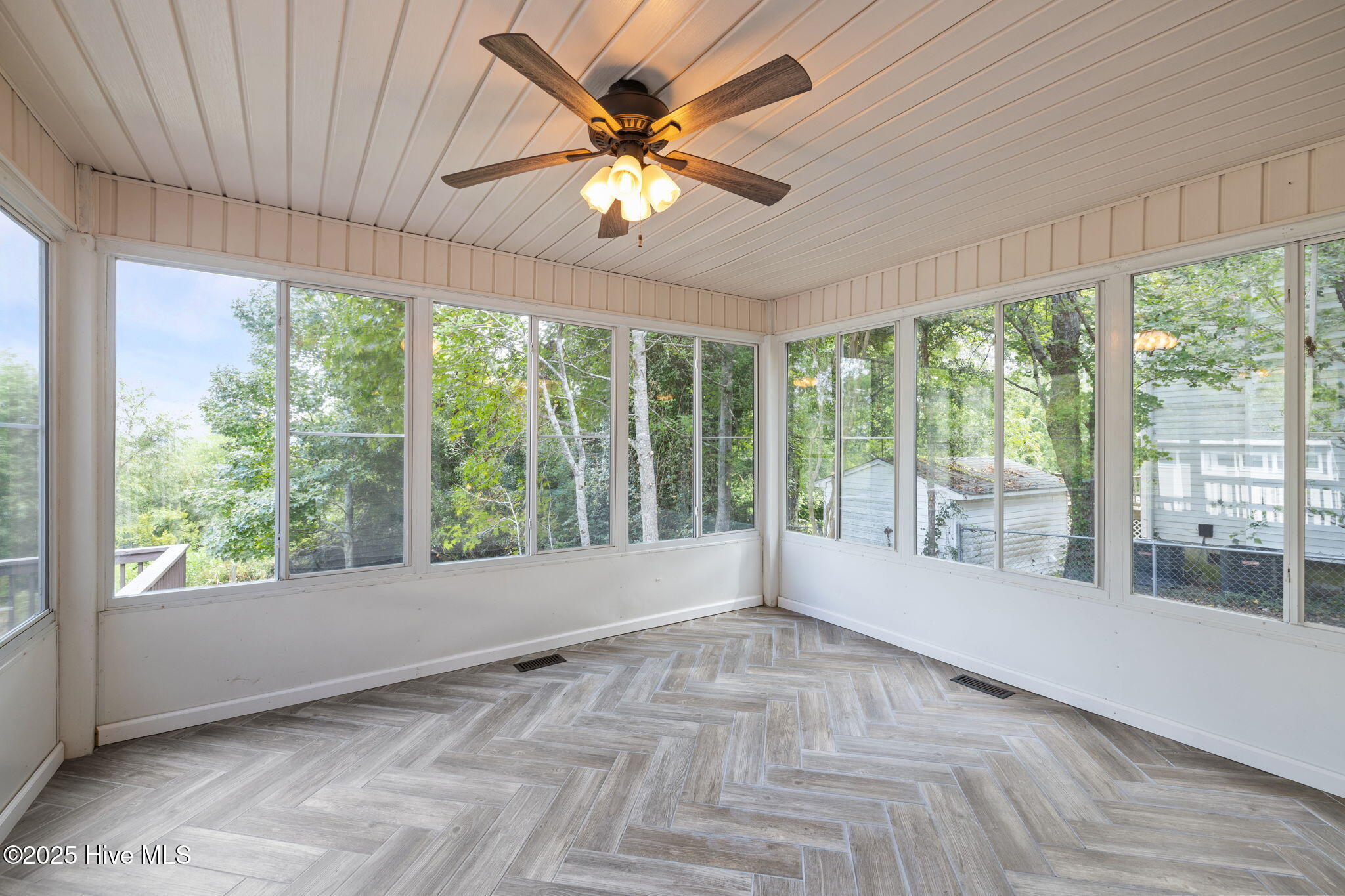 906 Ridge Water Boulevard Morehead City, NC 28557 - Photo 32 of 56 Fully Enclosed Sunroom
