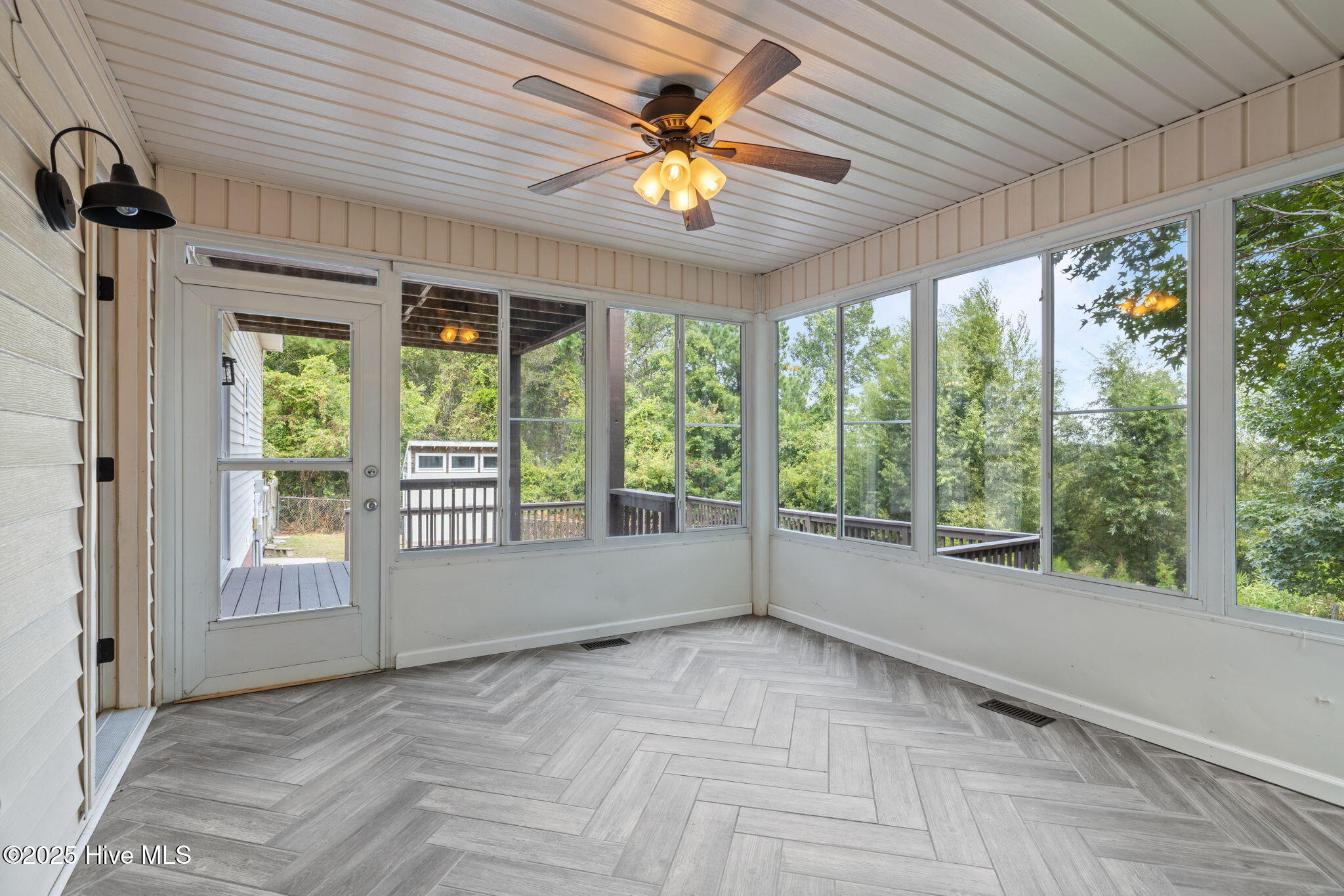 906 Ridge Water Boulevard Morehead City, NC 28557 - Photo 33 of 56 Fully Enclosed Sunroom
