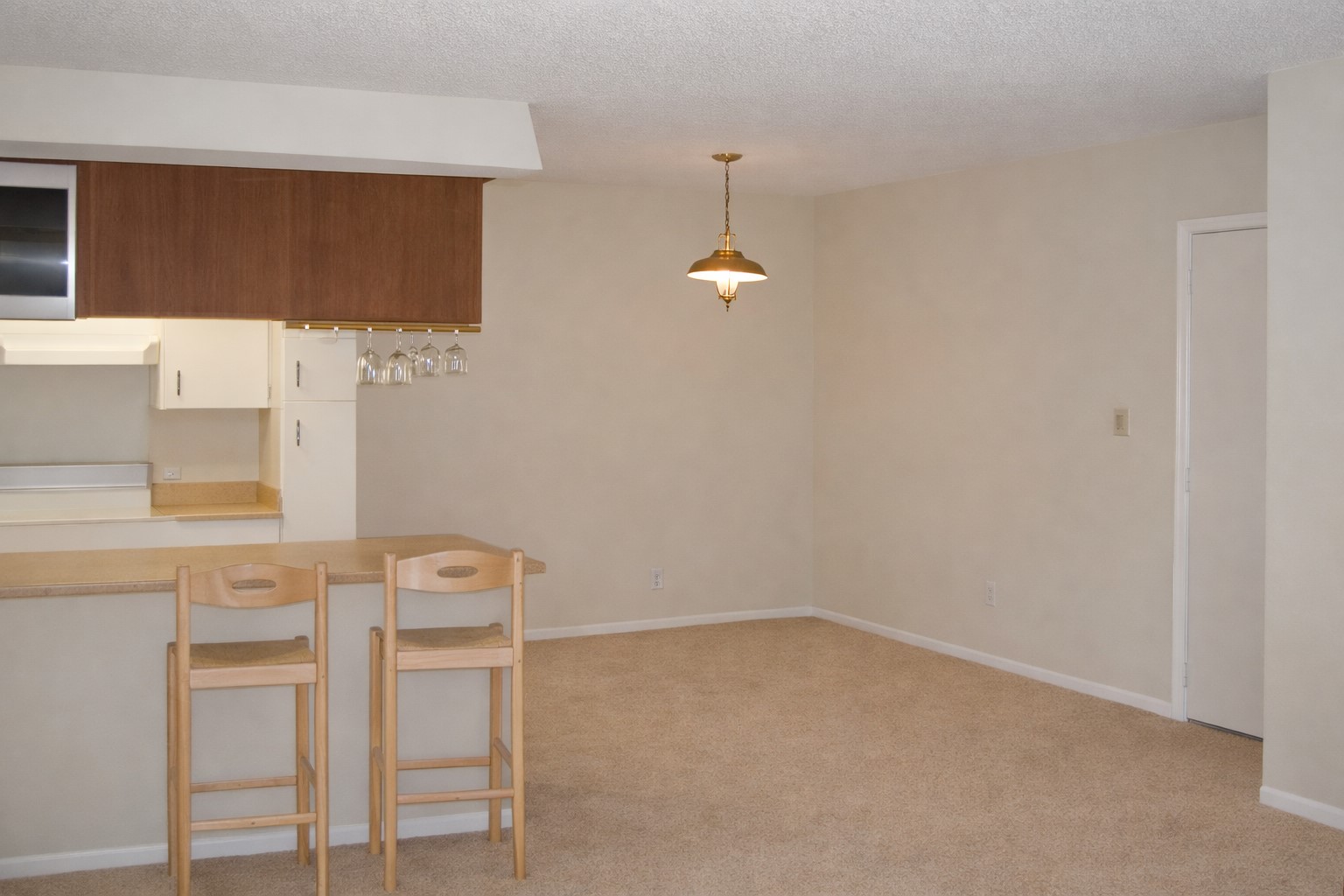 910 Duncan Lane, Unit 52 Austin, TX 78705 - Photo 9 of 9 a room with a table and chairs