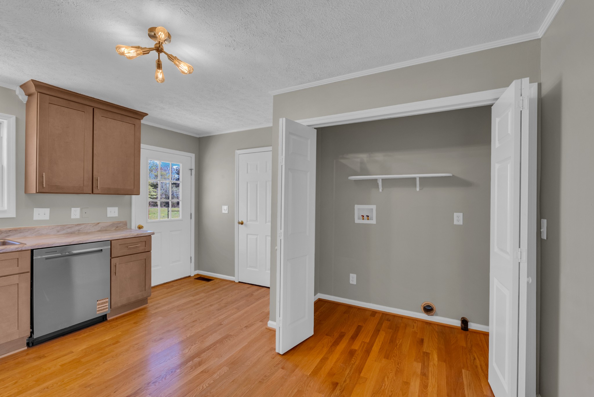 199 Tomahawk Lane Doyle, TN 38559 - Photo 11 of 29 a kitchen with a sink and a refrigerator