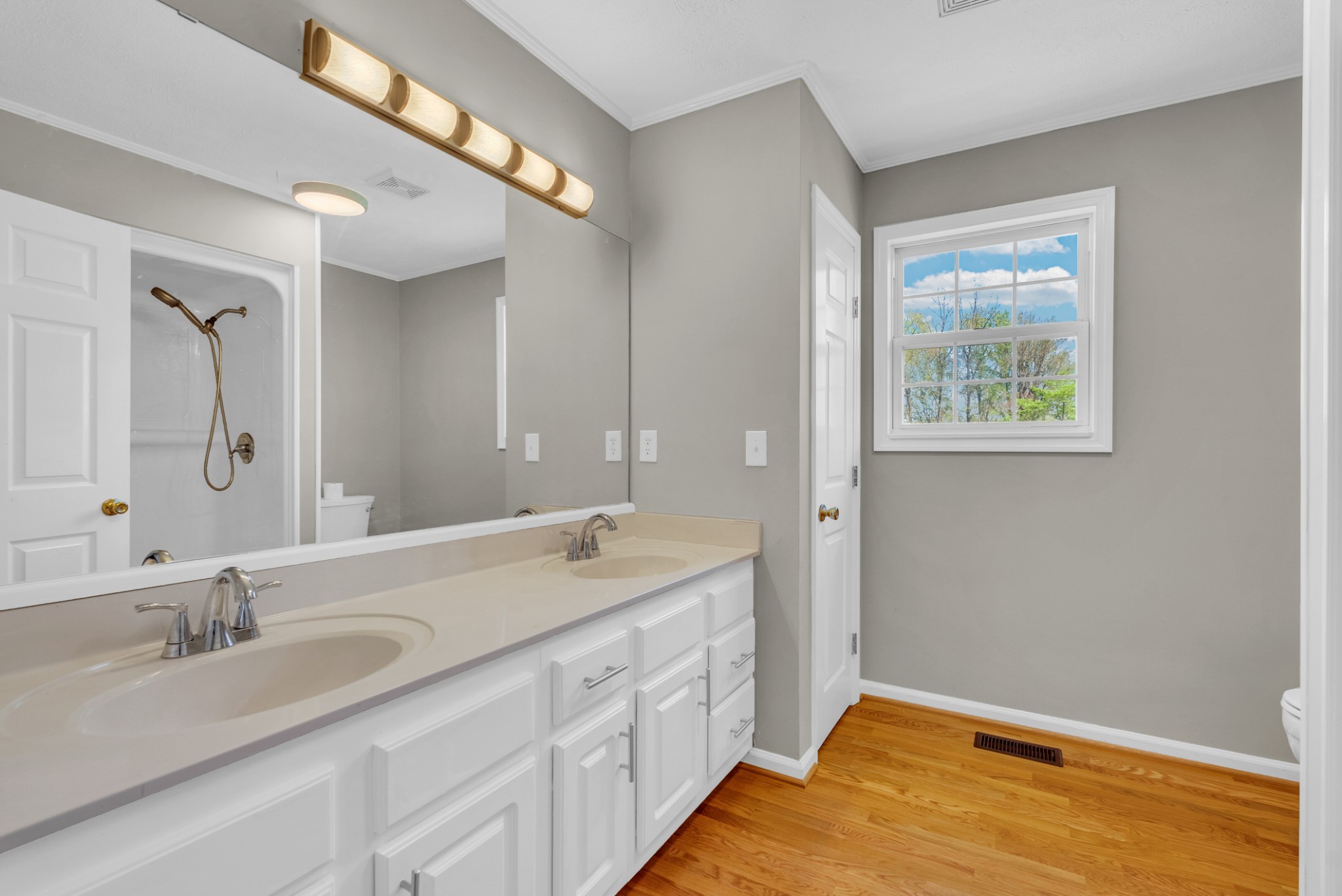199 Tomahawk Lane Doyle, TN 38559 - Photo 18 of 29 a bathroom with a granite countertop sink mirror and a bathtub