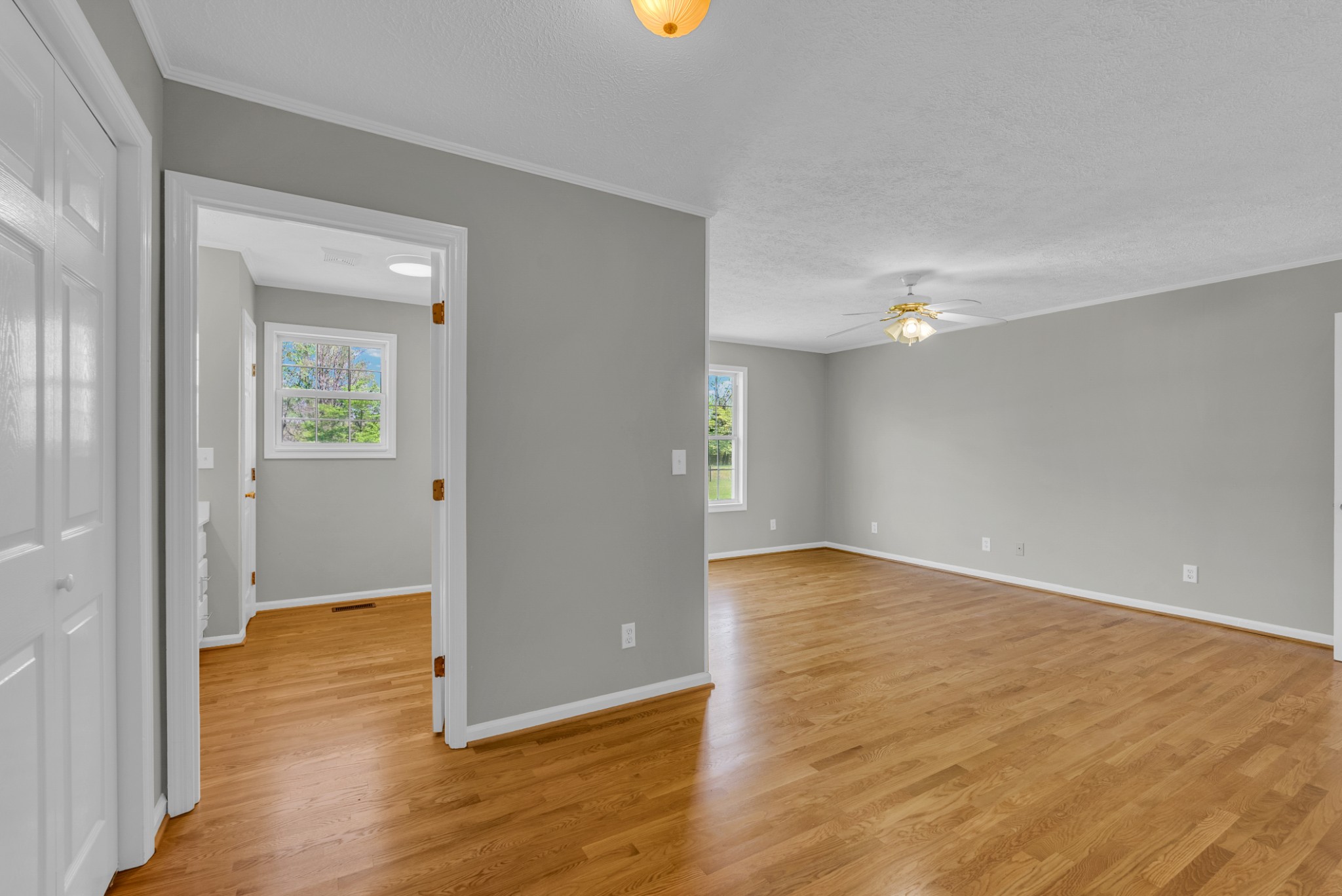 199 Tomahawk Lane Doyle, TN 38559 - Photo 20 of 29 a view of an empty room with wooden floor and a window