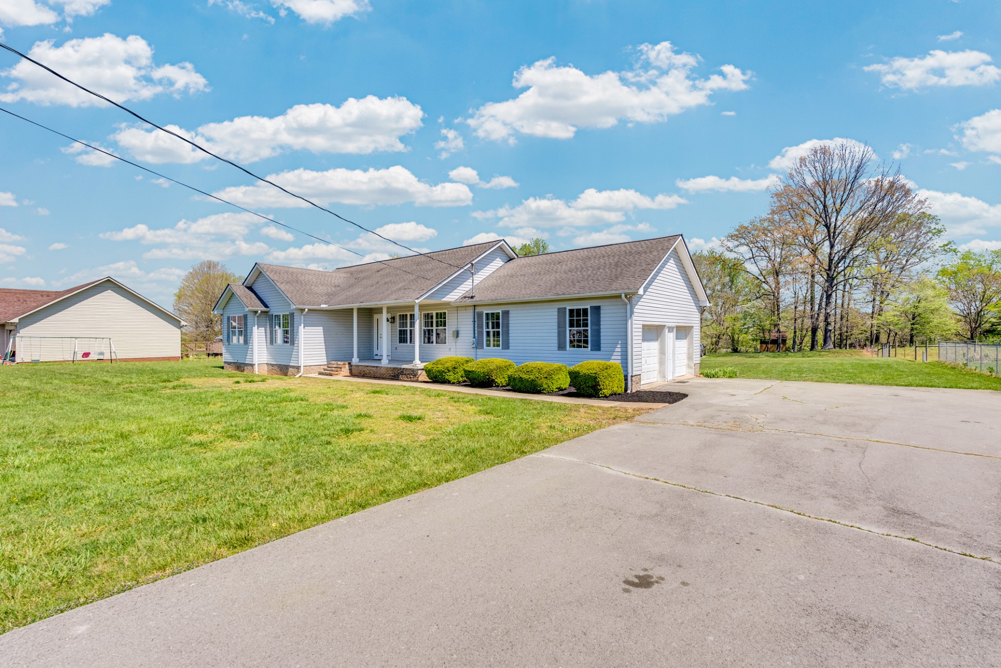 199 Tomahawk Lane Doyle, TN 38559 - Photo 2 of 29 a front view of house with yard and green space