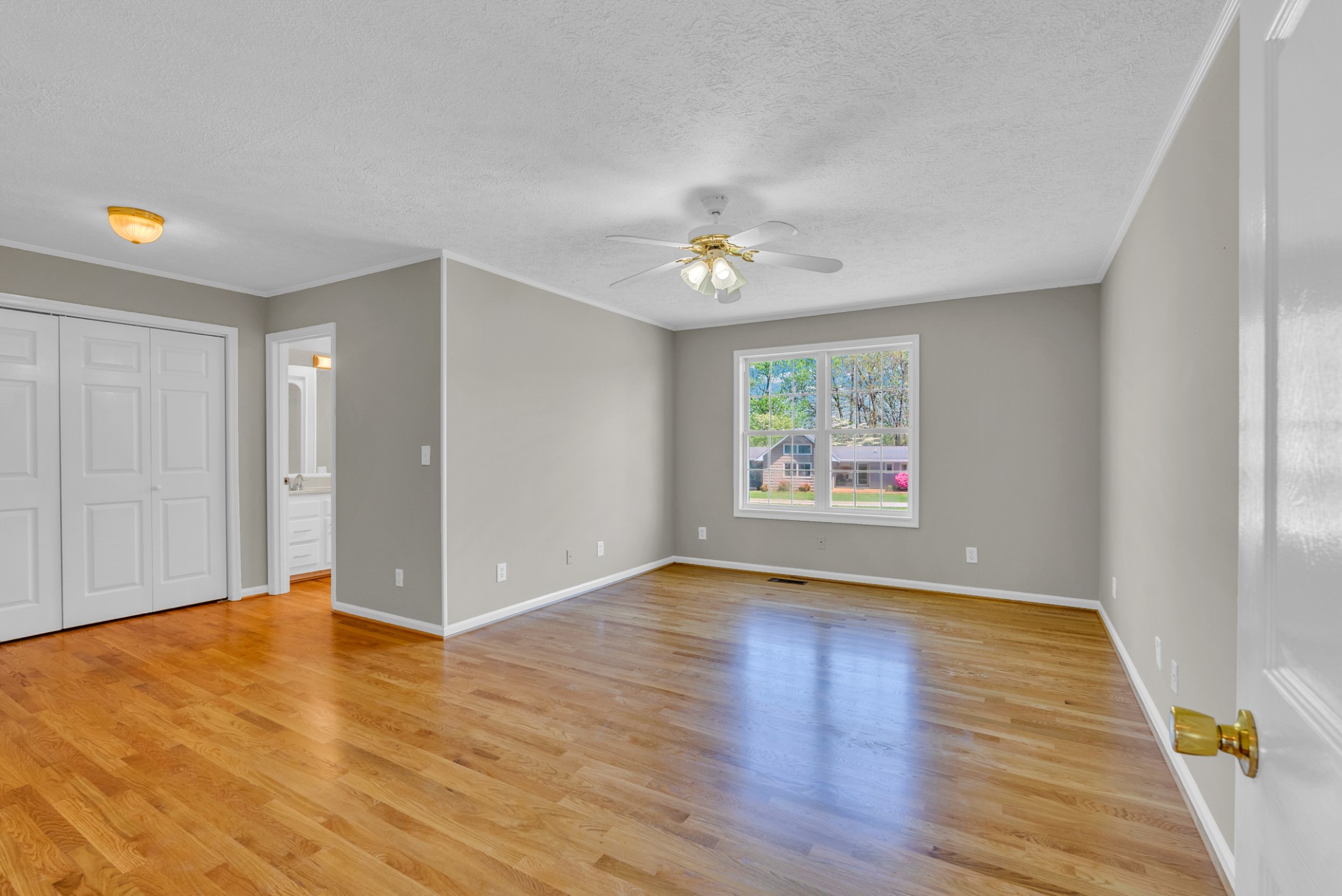 199 Tomahawk Lane Doyle, TN 38559 - Photo 22 of 29 wooden floor in an empty room with a window