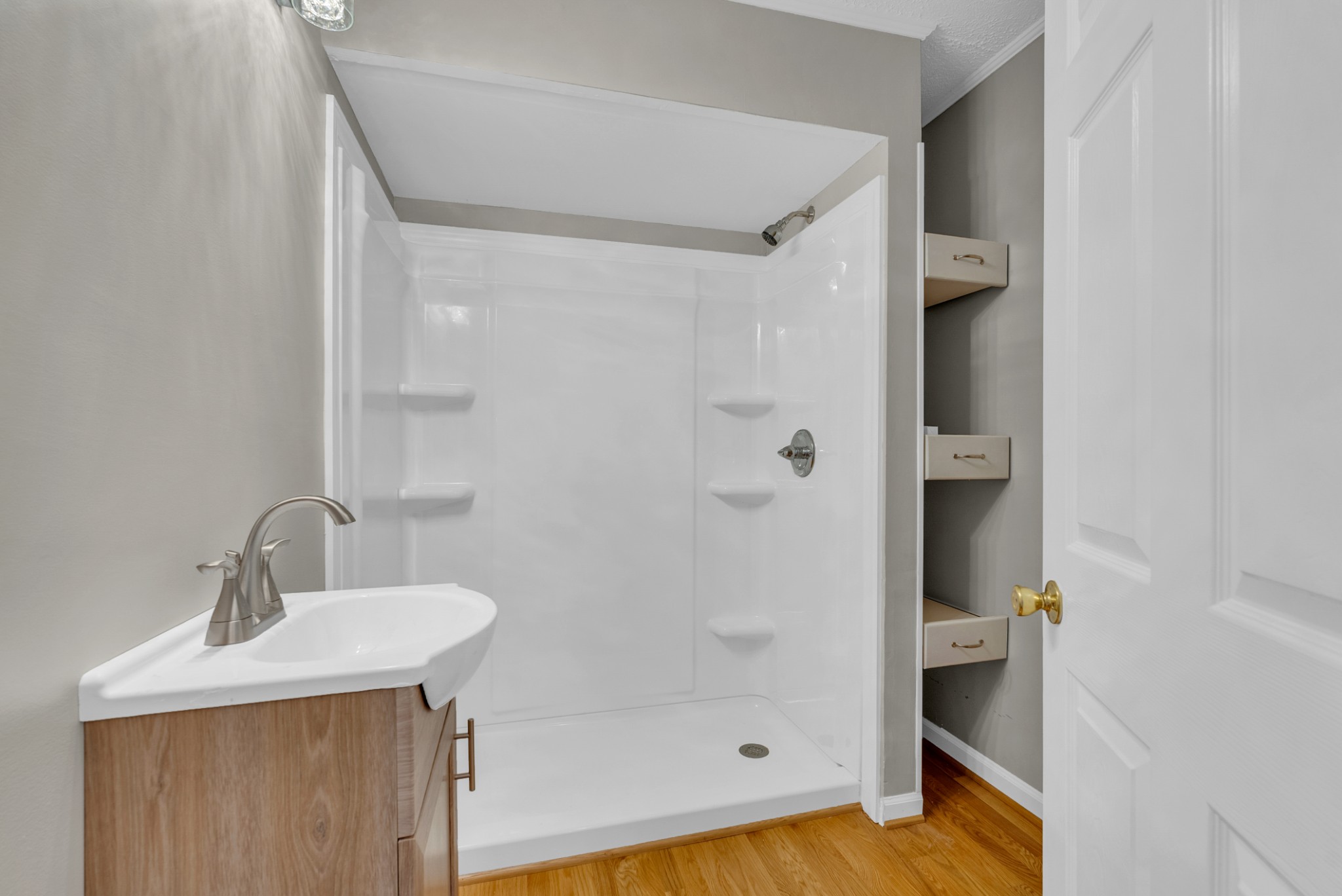 199 Tomahawk Lane Doyle, TN 38559 - Photo 23 of 29 a bathroom with a shower and a sink