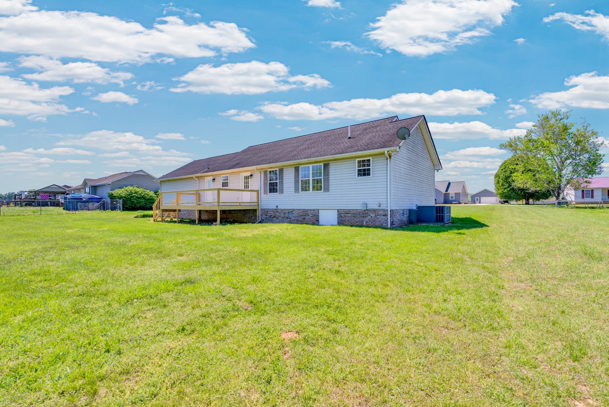 199 Tomahawk Lane Doyle, TN 38559 - Photo 6 of 29 a view of a house with a big yard and large tree