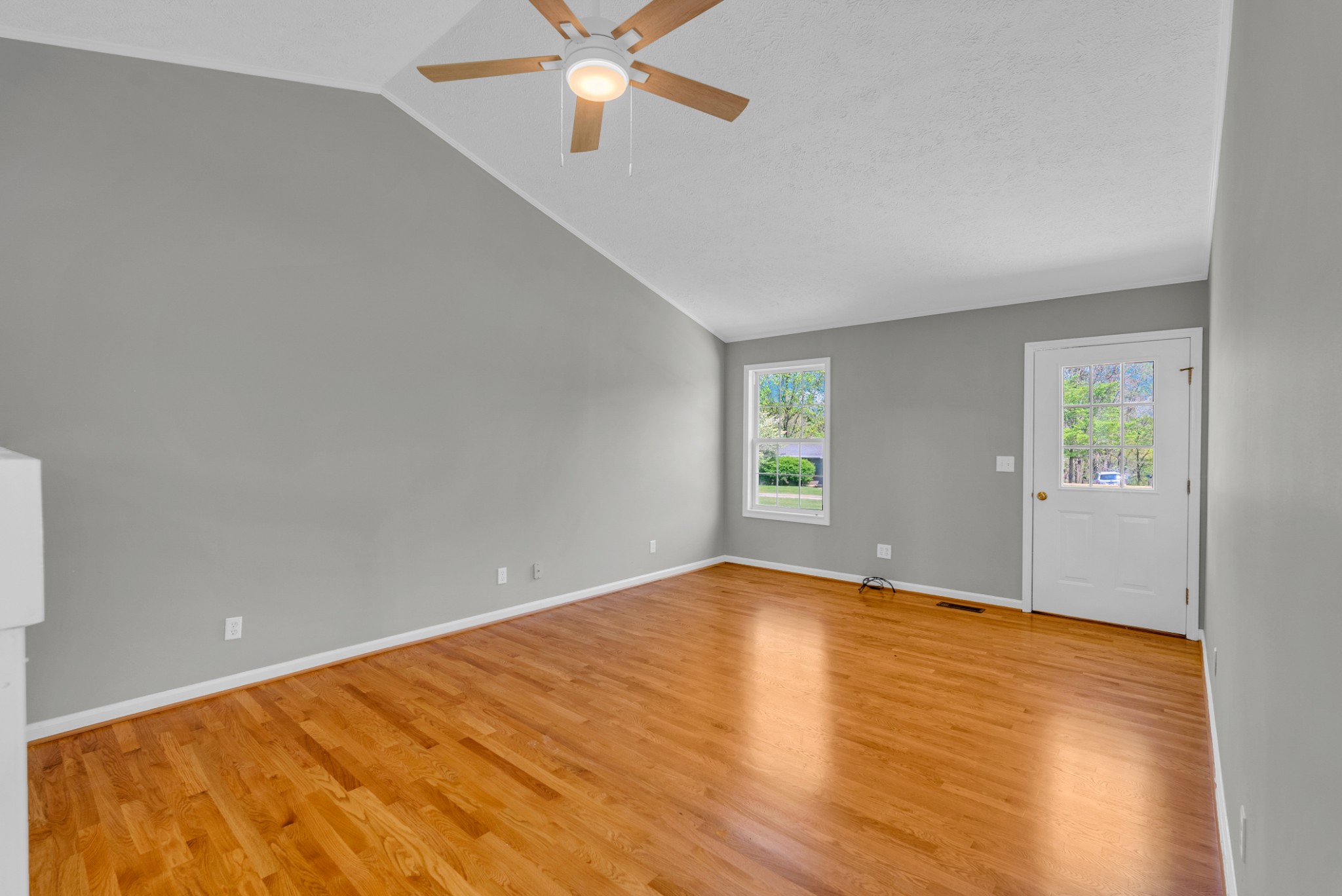 199 Tomahawk Lane Doyle, TN 38559 - Photo 9 of 29 wooden floor in an empty room with a window