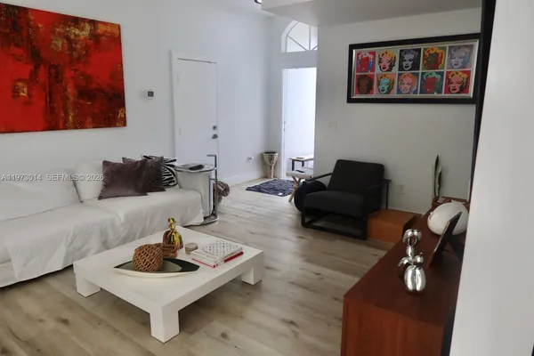 a living room with furniture and a couch