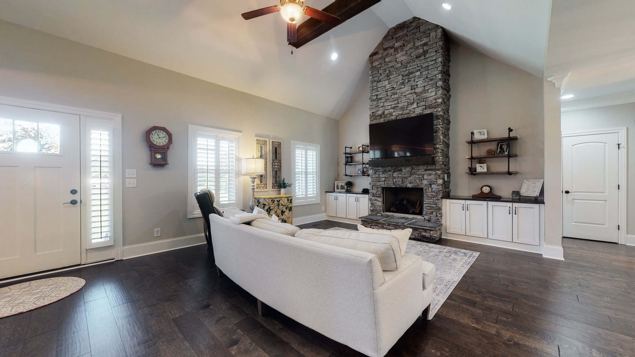 3908 Old Murfreesboro Road West Lebanon, TN 37090 - Photo 13 of 33 a living room with furniture a fireplace and a flat screen tv