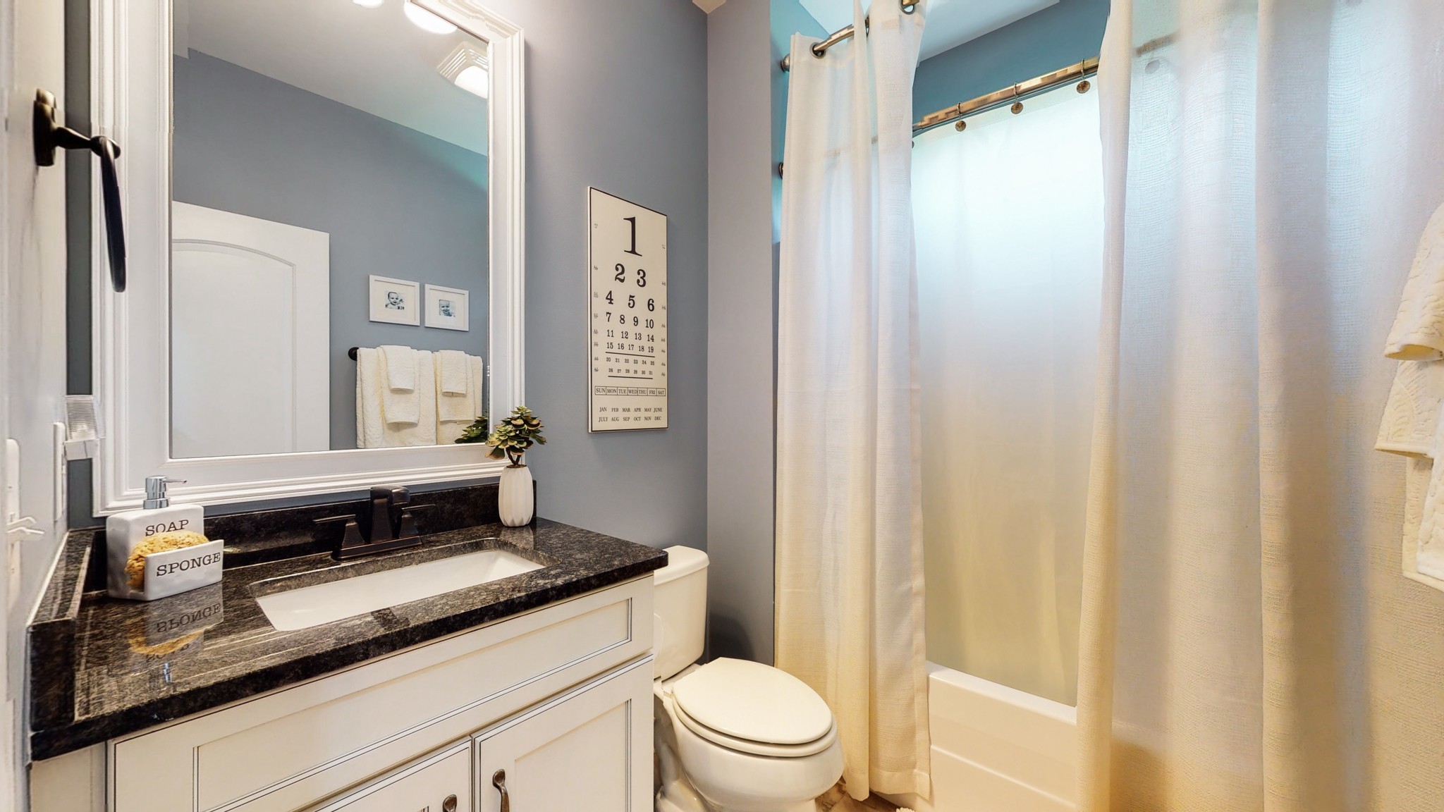 3908 Old Murfreesboro Road West Lebanon, TN 37090 - Photo 32 of 33 a bathroom with a granite countertop sink toilet and shower