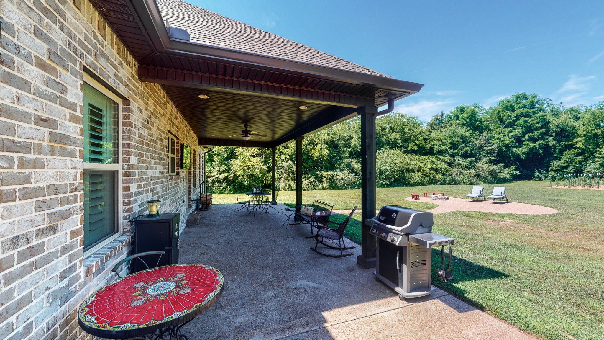 3908 Old Murfreesboro Road West Lebanon, TN 37090 - Photo 5 of 33 a view of a porch with furniture and a backyard