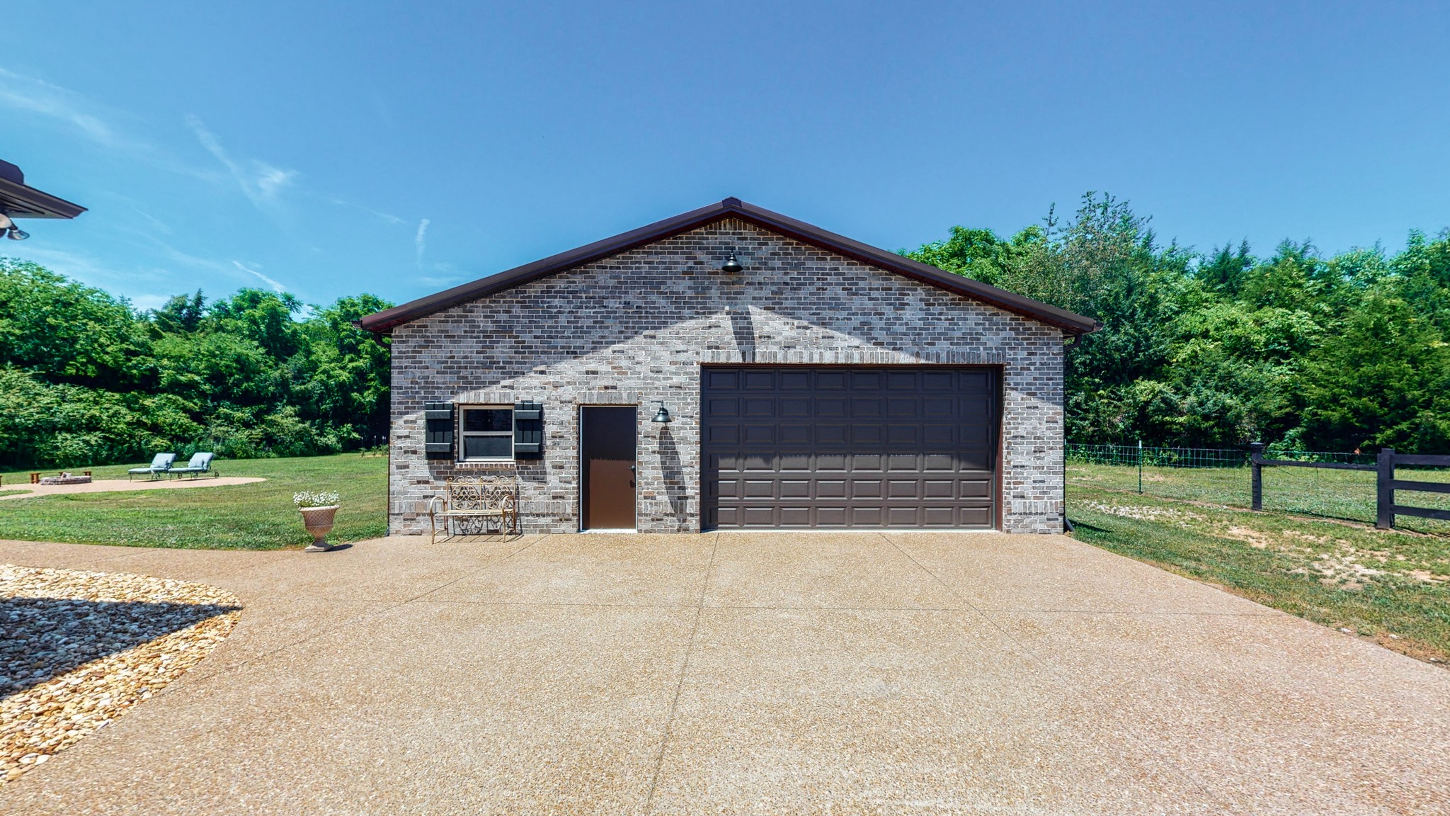 3908 Old Murfreesboro Road West Lebanon, TN 37090 - Photo 8 of 33 a front view of a house with a yard and garage