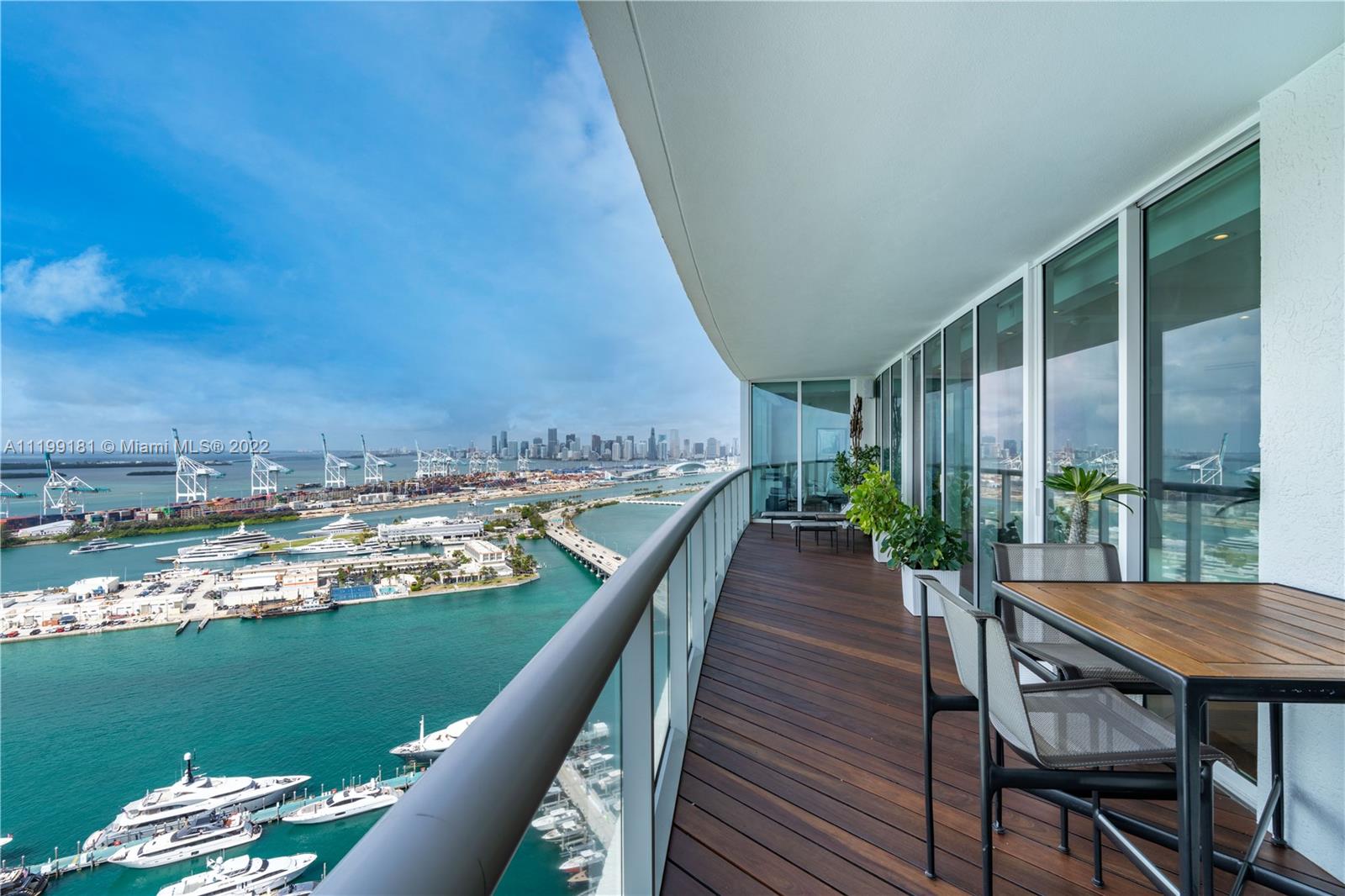 a view of balcony with furniture