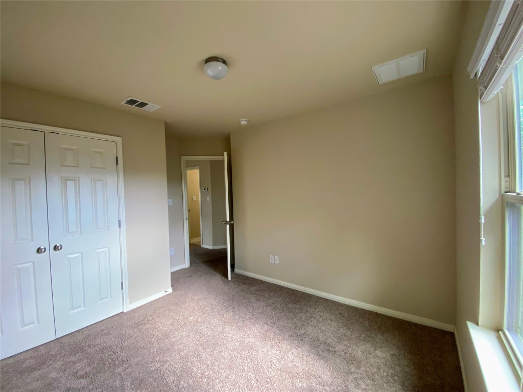 126 Preston Trail San Marcos, TX 78666 - Photo 15 of 24 a view of an empty room and a window