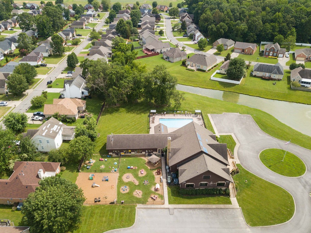 165 Foxrun Springfield, TN 37172 - Photo 54 of 62 an aerial view of a house with outdoor space pool seating area and yard