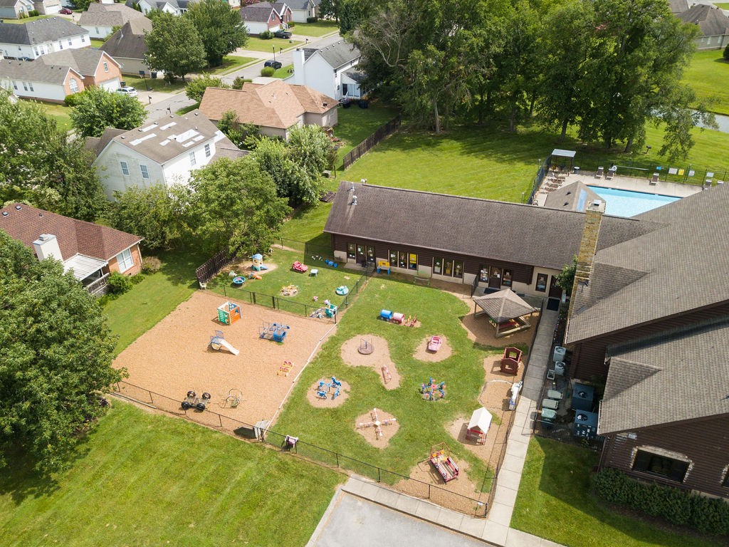 165 Foxrun Springfield, TN 37172 - Photo 55 of 62 an aerial view of a pool patio fire pit and outdoor seating