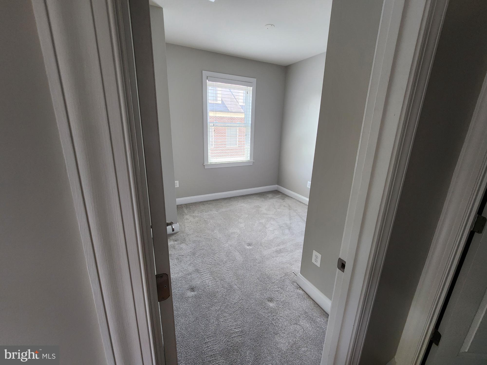 2 Maxwell Square Frederick, MD 21701 - Photo 11 of 16 a view of hallway with window