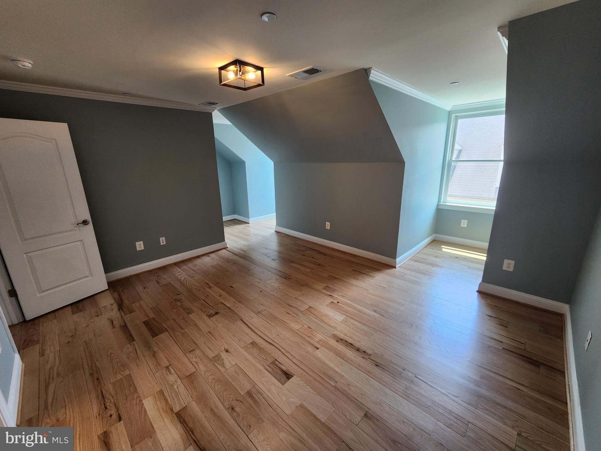 2 Maxwell Square Frederick, MD 21701 - Photo 14 of 16 a view of a livingroom with wooden floor