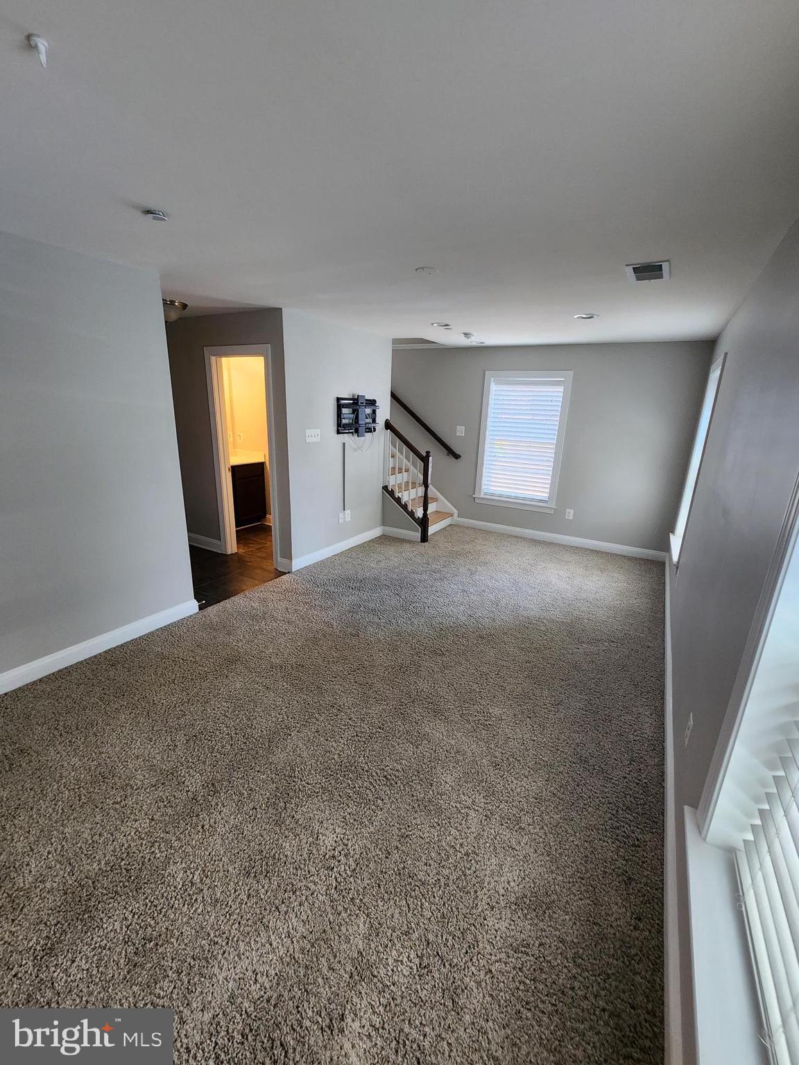 2 Maxwell Square Frederick, MD 21701 - Photo 15 of 16 a view of a livingroom with a fireplace and a window